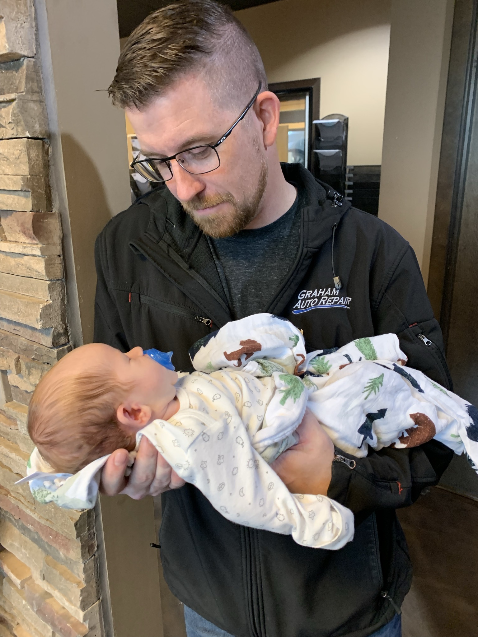 Graham Auto Repair Near Me in Graham, WA 98338 - Service Advisor Brian with Newborn Son